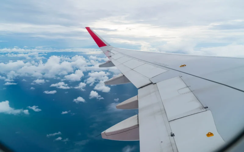 airplane-flying-clouds